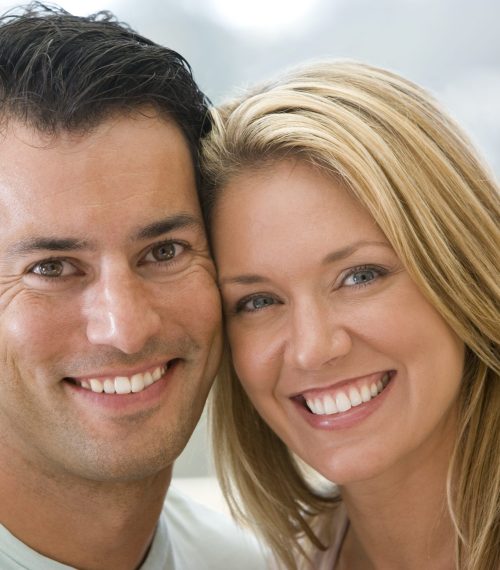 Couples looking at a computer screen together