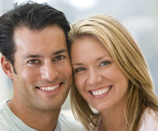 Couples looking at a computer screen together